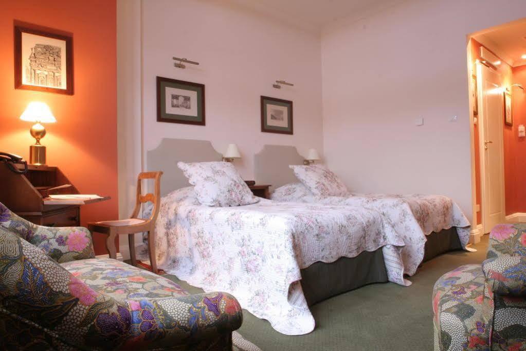 Hotel Grodek Krakow Bagian luar foto A room at the hotel