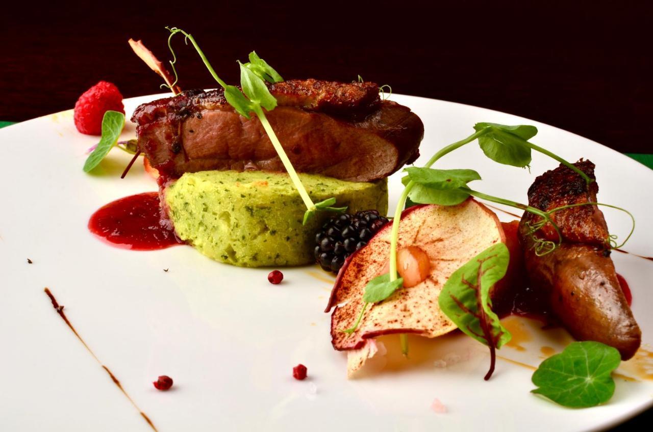 Hotel Grodek Krakow Bagian luar foto A modern French dish